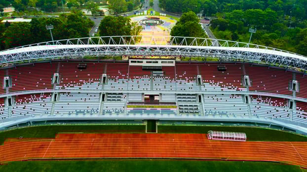 Aerial view of Palembang's largest soccer field, featuring a meticulously maintained green lawn. photo