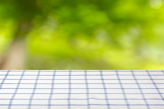 Empty wooden table with natural background photo