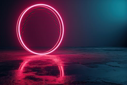 Glowing neon circle on beach at night photo