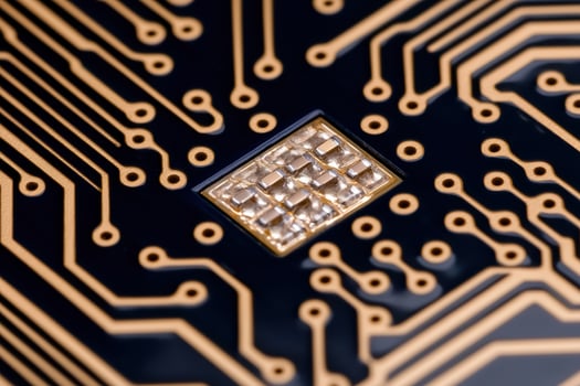 Close up of a complex circuit board with electronic components photo