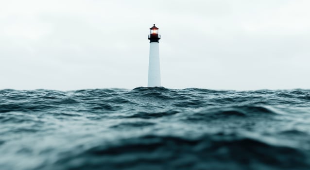 Lighthouse standing tall in the stormy sea photo