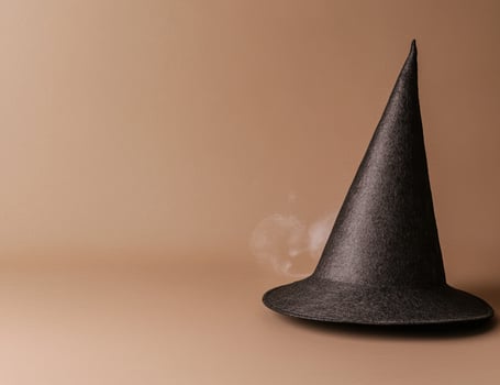 Mysterious witchs hat with smoke photo