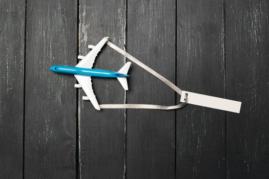 Model airplane on the wooden background photo