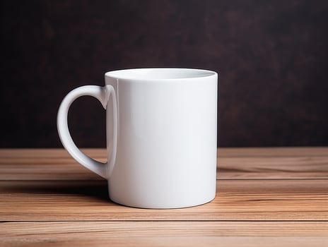 close up white mug on wooden table with dark background. white mug mockup photo
