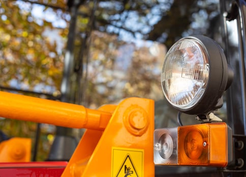 headlights and turn signals on agricultural machinery. Hazard warning lights, industry, copy space for text photo
