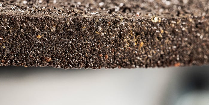Element of a cleaning abrasive wheel for a grinder, macro. photo