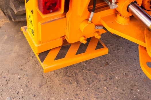 Stop, excavator leg for stability and safety, close-up, hydraulic stop photo