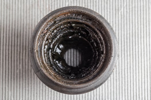 Old CV joint boot providing protection and dirt ingress into the constant velocity joint, macro photo