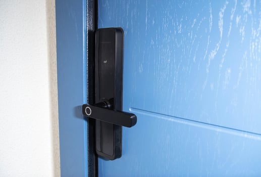 Modern electronic reliable door lock using an access password and a card. High burglary protection. Copy space for text photo