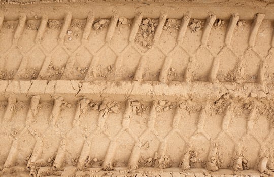 Track from the tread of a wheel of a truck and construction equipment, close-up, background photo