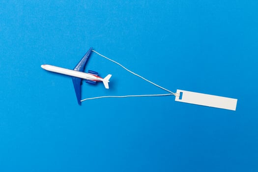 model of passenger plane on blue background photo