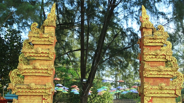 Balinese gate stands strong and beautiful in the afternoon photo