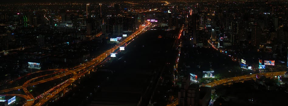 an aerial view of a city at night photo