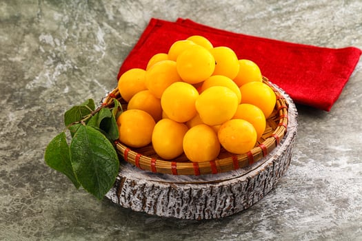 Ripe sweet juicy yellow plum photo