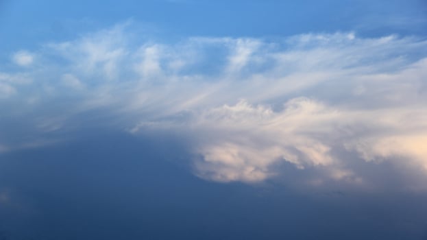 Majestic and surreal sunrise sky background with colorful clouds, golden hour photo