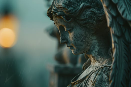 Weathered stone statue in contemplative pose photo