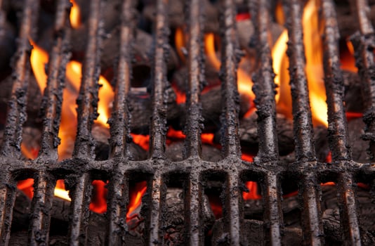 Glowing embers and flames in a fireplace photo