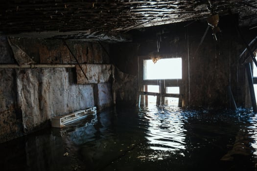 Flooded old house interior. Natural disaster concept photo