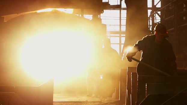 An Industrial Worker within a Heavy Machinery Environment with various dynamics and actions. Stock Clip photo