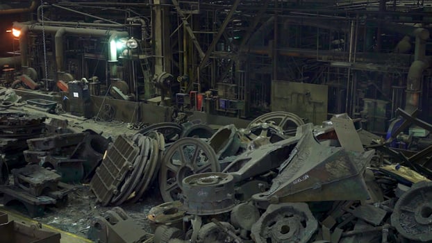 The Process of Industrial Scrap Processing Happening Within a Factory Environment. Stock Clip photo