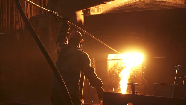A dedicated workers silhouette shines in an industrial setting, highlighting their key role. Stock Clip photo