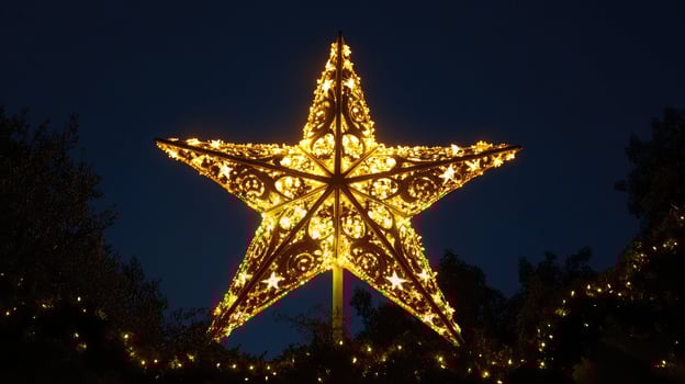 Bright christmas star shining over decorated christmas market photo