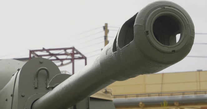 A dramatic sequence highlights a tanks power in an urban setting photo
