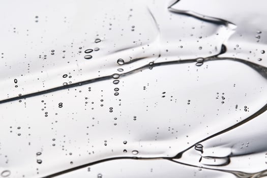 Texture of the hair gel or hyaluronic gel for the face. photo