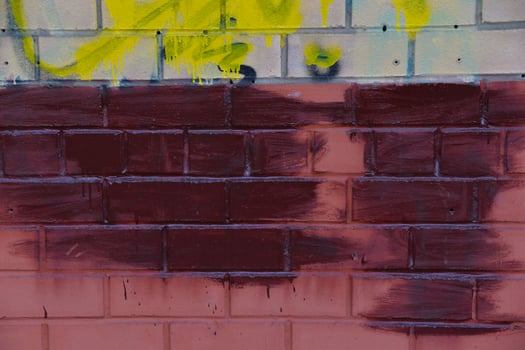A wall smeared with paint. Painted over graffiti. photo