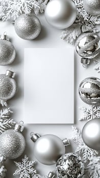 Blank Christmas card surrounded by minimalistic gold and silver baubles chic holiday decor photo