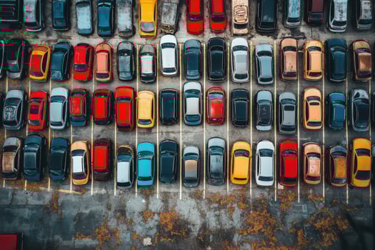 Aerial view of a full parking lot with colorful cars. photo