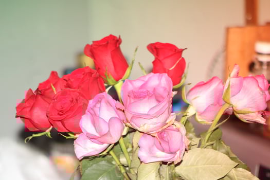 Bouquet Of Red And Pink Roses In A Vase. photo