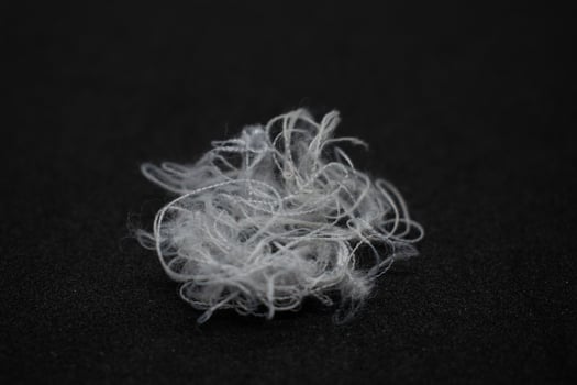 Messy and tangled white threads on Black background photo