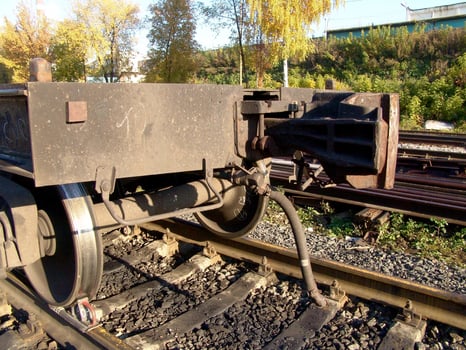 Brown Railway Track Surrounded by Trees and Plants photo