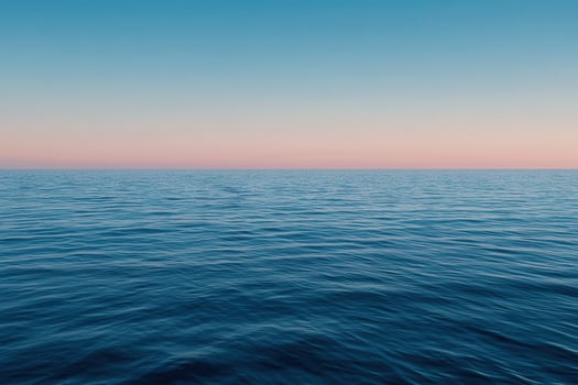 Calm ocean surface reflecting twilight sky at dusk over the horizon photo