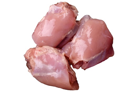 Fresh raw chicken thigh fillets with salt, spices and herbs photo
