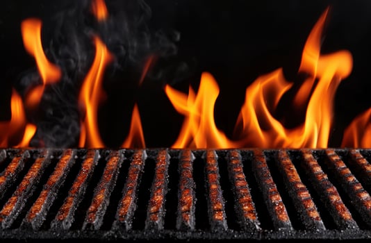 Sizzling grill with flames and charred meat photo