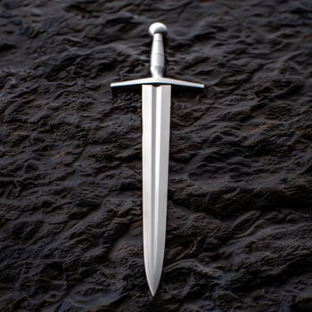 medieval sword on dark rock background photo