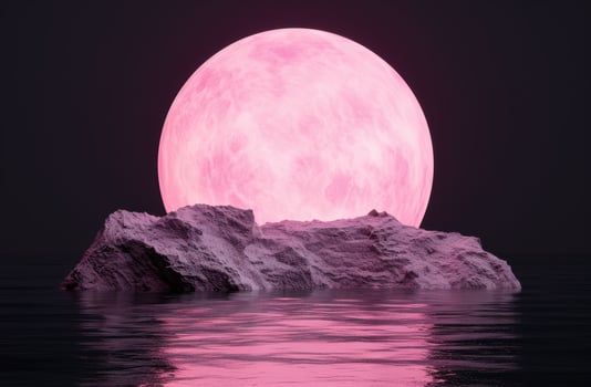 Serene pink moon over rocky landscape photo