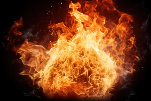 Intense flames engulfing the darkness photo