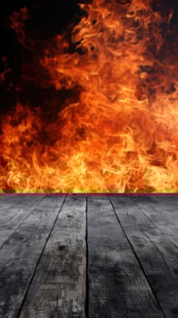 Raging fire with wooden floor background photo