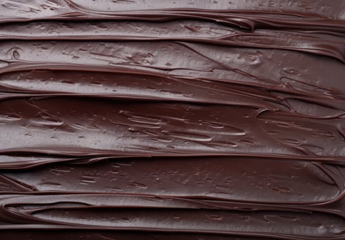 Smooth dark chocolate texture background photo