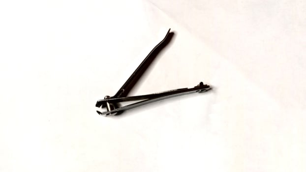 Metal Nail Clipper on White Background, Manicure, Pedicure Tool photo