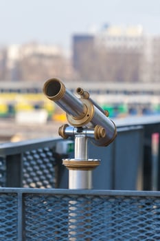 Telescope overlooking for city streets from above photo