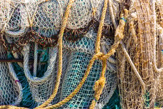 Old color fishing nets and ropes photo
