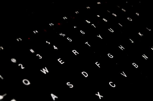 Black keyboard close up isolated photo