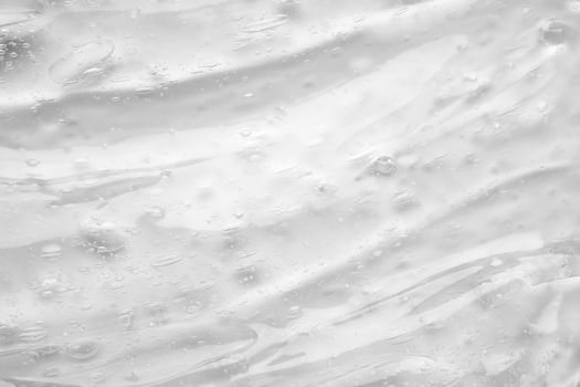Transparent clear liquid serum gel cosmetic texture background photo