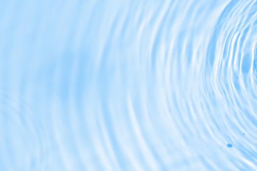 Abstract transparent water shadow surface texture natural ripple on blue background photo