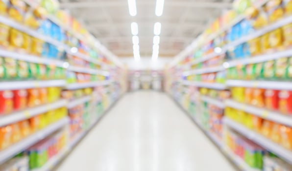 supermarket store aisle interior abstract blurred background photo