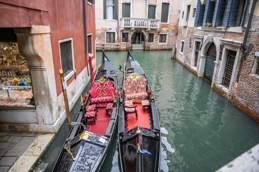View on canal with boat, Venice Italy. photo
